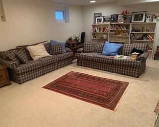 Pair of Sofas / Rug is 5 x 6 ft / 3 pieces Bookcases / lots of books toys and games 