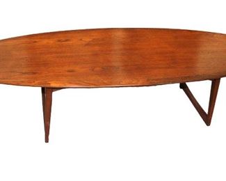
Lot 505
Mid century modern walnut elongated oval coffee table
