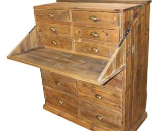 
Lot 526
Rustic multi drawer pine apothecary style chest with flip down work station
