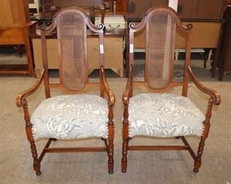 
Lot 527
Pair of antique walnut frame scroll arm chairs with cane backs in the William and Mary style
