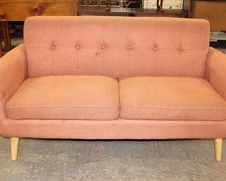 
Lot 529
Modern design 2 cushion button tufted settee in the salmon color tweed style upholstery
