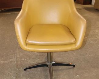 
Lot 531
Mid century modern swivel leather like lounge chair
