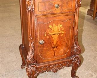 
Lot 550
Antique French style carved burl walnut nightstand with exotic wood inlay

