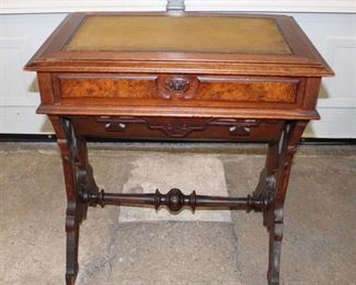 
Lot 557
Antique Victorian walnut sewing table
