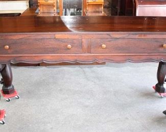 
Lot 574
Antique rosewood 2 drawer console with heavily carved legs
