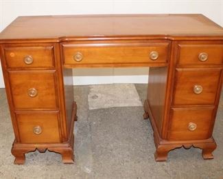 
Lot 573
Vintage Kling solid maple 7 drawer kneehole desk
