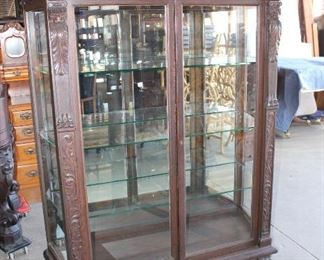 
Lot 575
Antique lion carved oak 2 door china cabinet with glass shelves
