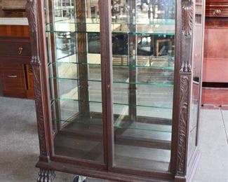 
Lot 576
Antique lion carved oak 2 door china cabinet with glass shelves
