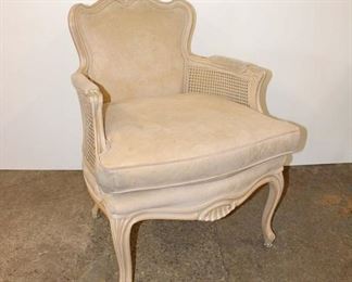
Lot 583
French style double cane upholstered arm chair has some staining
