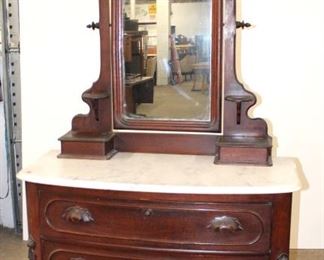 
Lot 587
Antique Victorian walnut 3 drawer marble top dresser with mirror and glove boxes, marble has small hairline
