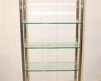
Lot 588
Mid century modern design chrome and glass shelf étagère in the manner of Milo Baughman
