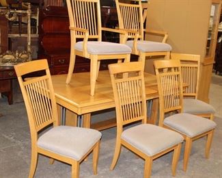 
Lot 593
Vaughn Furniture Co. 7pc contemporary oak dining room table with 6 chairs, (1) 18" leaf and custom table pads
