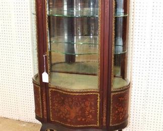 
Lot 609
Beautiful antique French marquetry inlay serpentine display case with original glass shelves, some inlay loss
