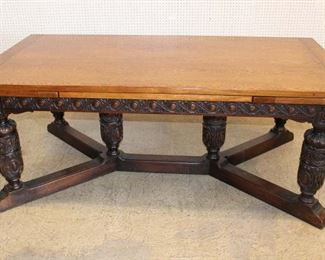 
Lot 618
Antique solid oak Jacobean style dining room table with 2 self storing 21" extensions
