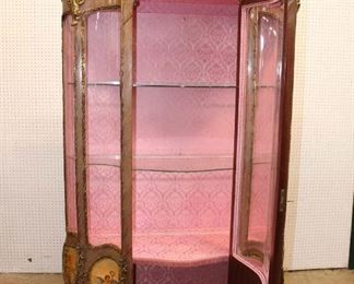 
Lot 619
Vintage Louis XV Style paint decorated vitrine with heavy applied bronze in the walnut, has some veneer loss
