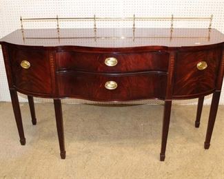 
Lot 629
Thomasville burl mahogany with inlay serpentine 2 drawer 2 door spade foot buffet with brass gallery
