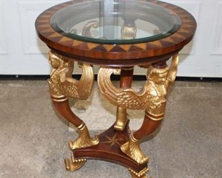 
Lot 632
Beautiful Maitland Smith Winged lady glass top lamp table with inlay
