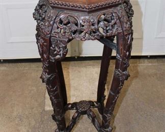 
Lot 633
Antique carved Asian hardwood marble top plant stand
