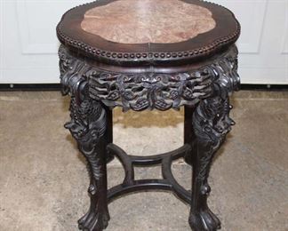 
Lot 634
Antique Asian hardwood marble top lamp table

