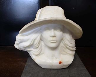 
Lot 635
Antique solid marble bust of lady wearing a sun hat, missing piece of marble off bottom
