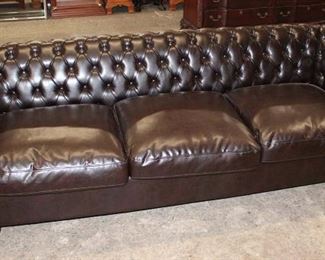 
Lot 642
Nice Chesterfield style leather like button tuft sofa in the dark brown color
