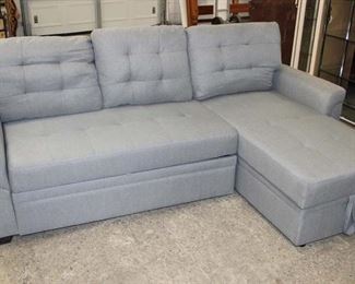 
Lot 643
New out of the box 2pc sofa chaise with storage and pullout bed in the grey tweed style upholstery
