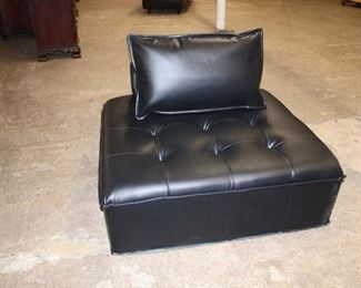 
Lot 649
Modular cube accent seat in the black leather style with back and cushion
