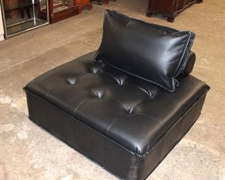 
Lot 650
Modular cube accent seat in the black leather style with back and cushion
