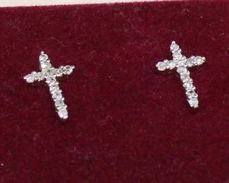
Lot 654
14K white gold cross shaped diamond earrings
