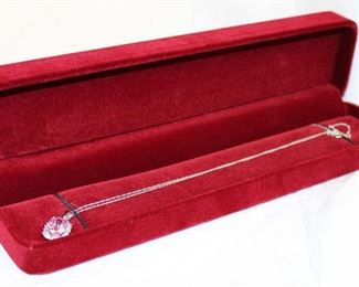
Lot 660
Pink sapphire and diamonds 10K gold necklace approx. 16"
