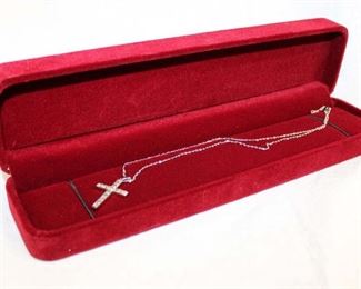 
Lot 662
.52ct diamond cross with 925 sterling silver necklace approx. 16"
