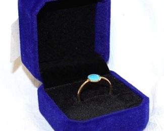 
Lot 674
.75 turquoise and 14K yellow gold over 925 sterling silver ring size 6.5
