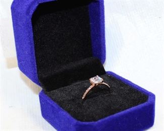 
Lot 673
.75ct aquamarine and .18ct diamond 10K rose gold ring size 6.5
