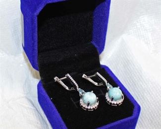 
Lot 684
Larimer white sapphire and blue topaz sterling silver earrings
