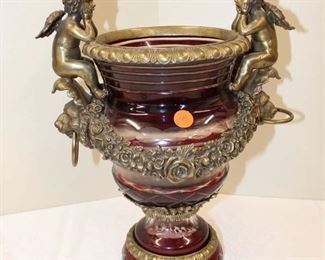 
Lot 694
Bohemian cut to clear leaded crystal vase with applied bronze
