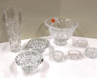
Lot 703
8 pieces of leaded crystal including 4 salts, 2 candle stands, more
