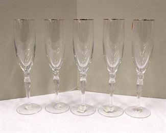 
Lot 708
Set of 5 Waterford leaded crystal champagne flutes w/gold rims
