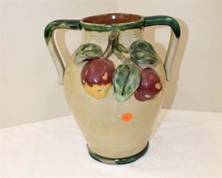 
Lot 725
C and T redware pottery double handle vase
