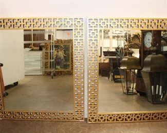
Lot 767
Pair of pierced carved frame decorator mirrors, has some paint loss approx. 36" w x 39" h
