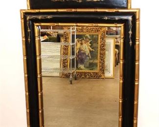 
Lot 768
Asian decorated black and gold mirror approx. 28" w x 54" h
