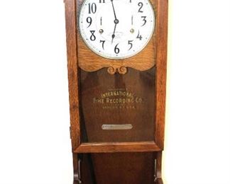 
Lot 775
Antique International oak case time clock approx. 16" w x 10" d x 48" h

