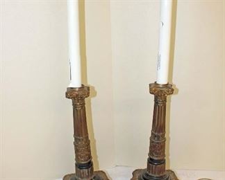 
Lot 785
Pair of vintage metal base candle stick lamps with lion heads approx. 6" w x 6" d x 27" h

