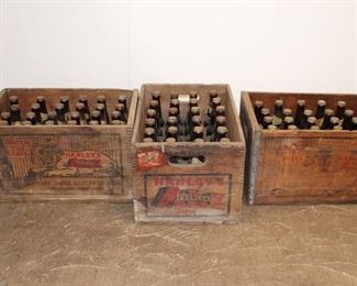 
Lot 790
3 Cases of Antique Hanley's beer in wooden dovetail crates with Pennsylvania Tax Stamp on bottle caps, original Peerless art on crates, all in original found condition approx. 72 bottles
