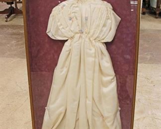 
Lot 793
Antique youth dress under glass in deep frame approx. 23" w x 3" d x 40" h
