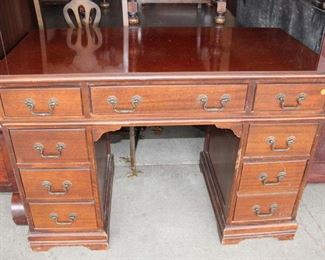 
Lot 796
Vintage mahogany 9 drawer kneehole desk
