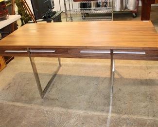 
Lot 812
Cool mid century style walnut and chrome 4 drawer executive desk
