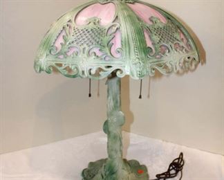 
Lot 833
Vintage slag glass panel lamp in the mint green with pink slag
