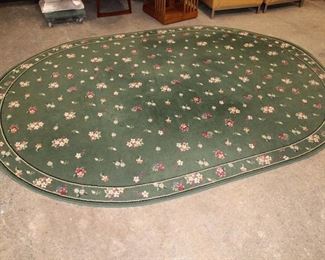 
Lot 834
7' 6" x 10' 9" floral pattern oval rug by Shaw
