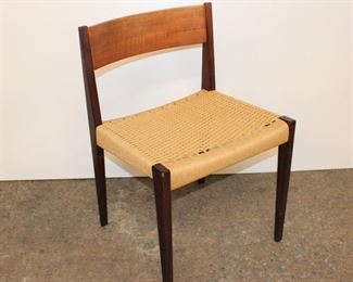 
Lot 627
Mid Century Modern walnut, teak and rosewood rush bottom chair in the manner of Hans Wegner
