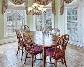 Dining table with 6 chairs by Ethan Allen